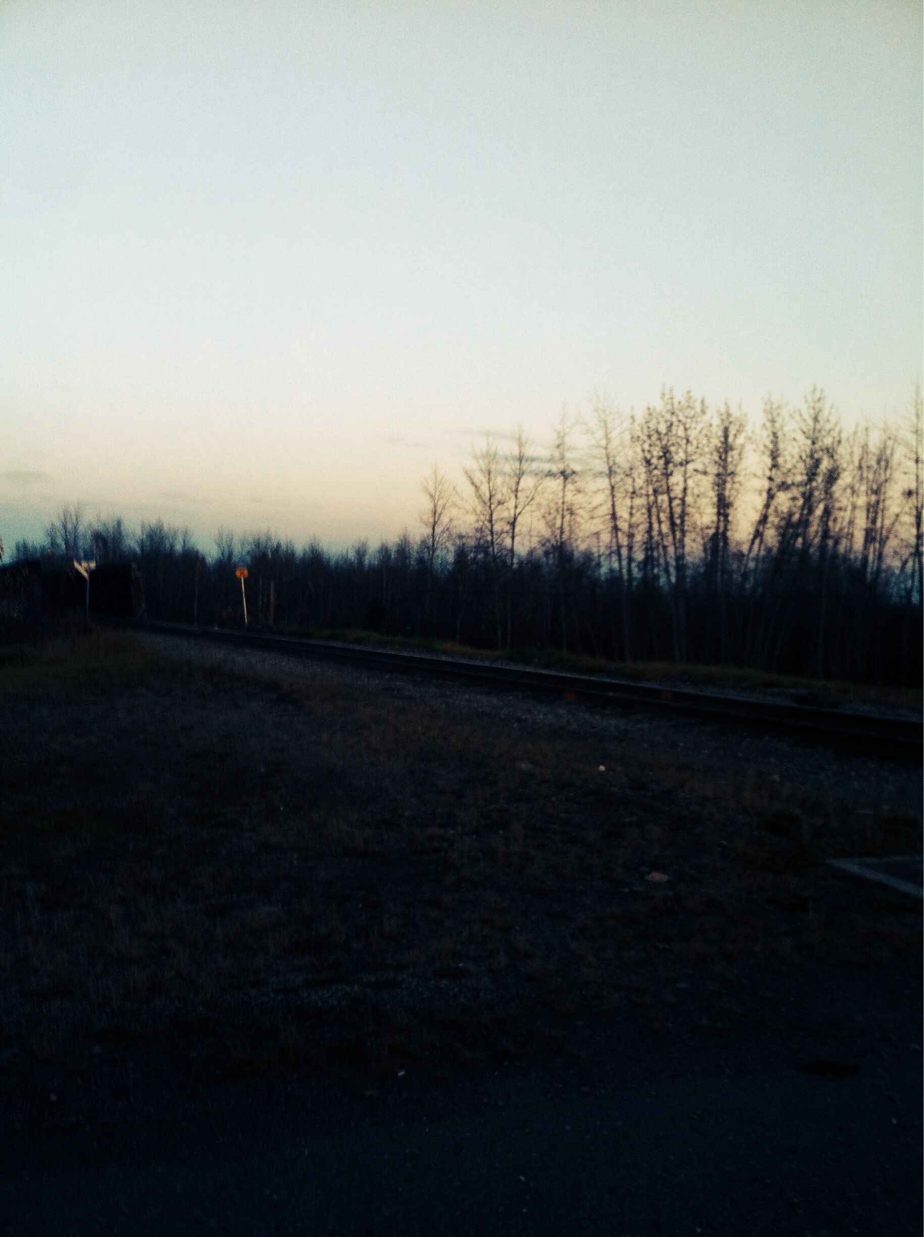 Going out to eat and took a pic of the pretty sun set and the train track.