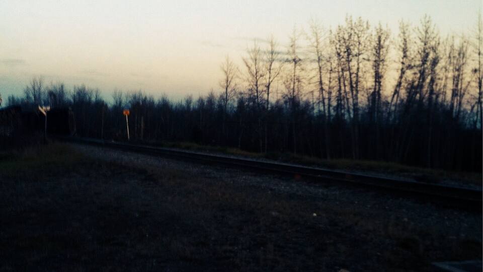 Going out to eat and took a pic of the pretty sun set and the train track.
