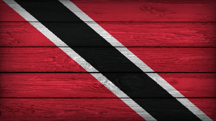 The flag of TRINIDAD painted on a wooden table with Original Colors