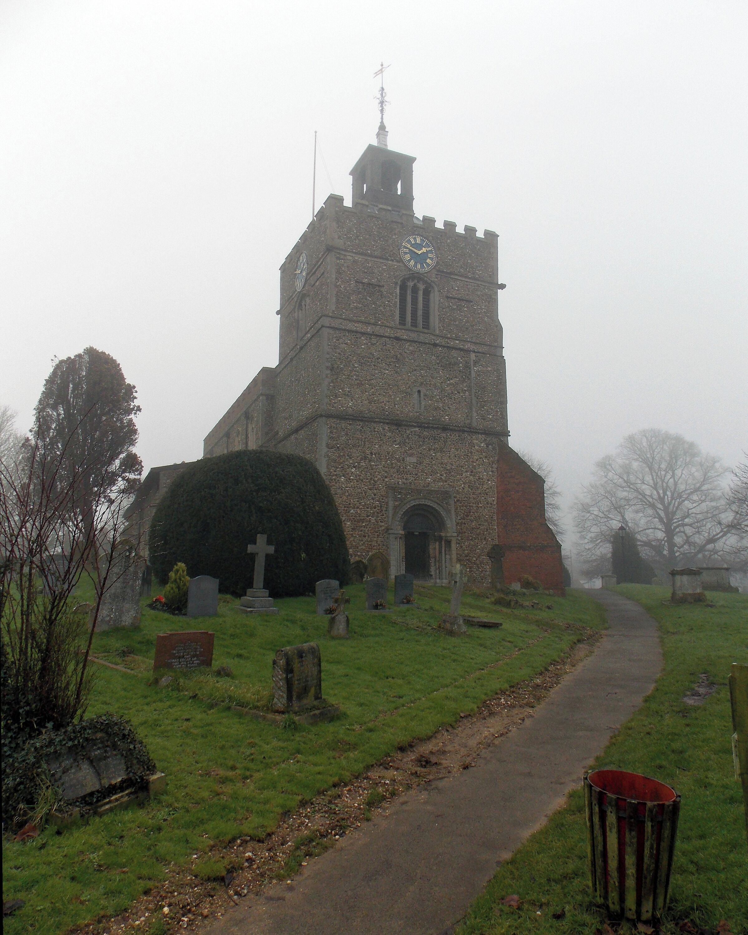 A view on a misty day from the north-west of St John the Baptist's Church, Finchingfield, Essex, England. Software: file lens-corrected and optimized with DxO OpticsPro 10 Elite, and further optimized with Adobe Photoshop CS2.