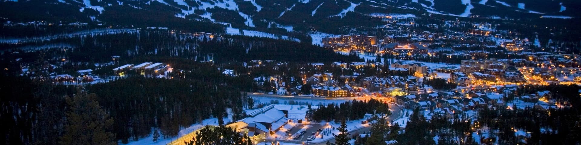 Breckenridge showing mountains, a small town or village and snow