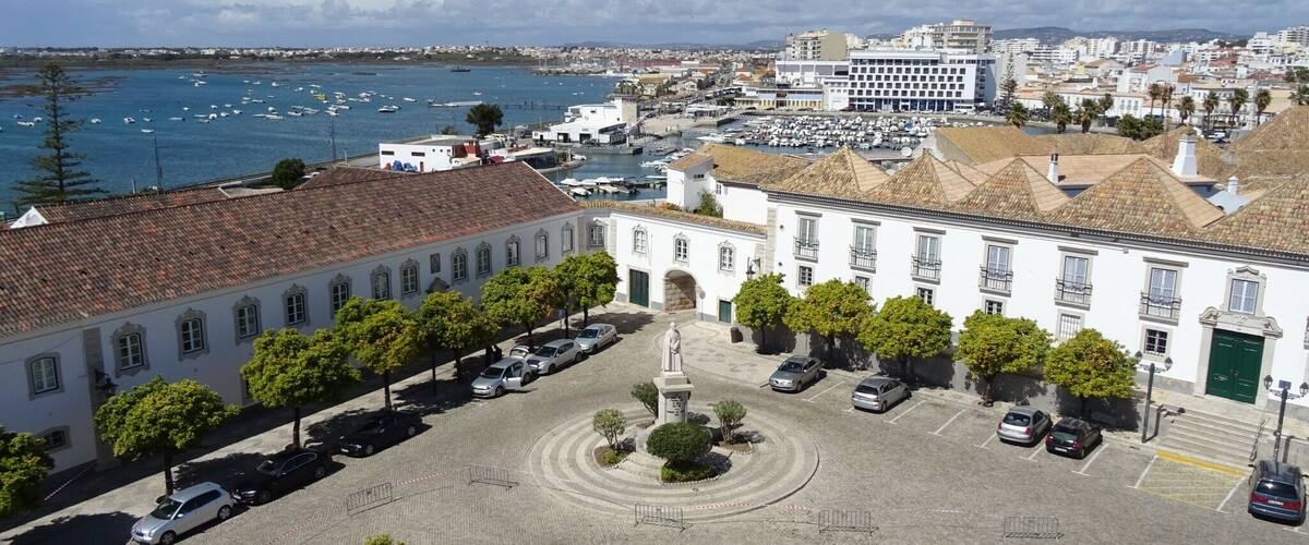 Overlooking the square lined with #orangetrees from the top of the #belltower #faro #portugal #church #view