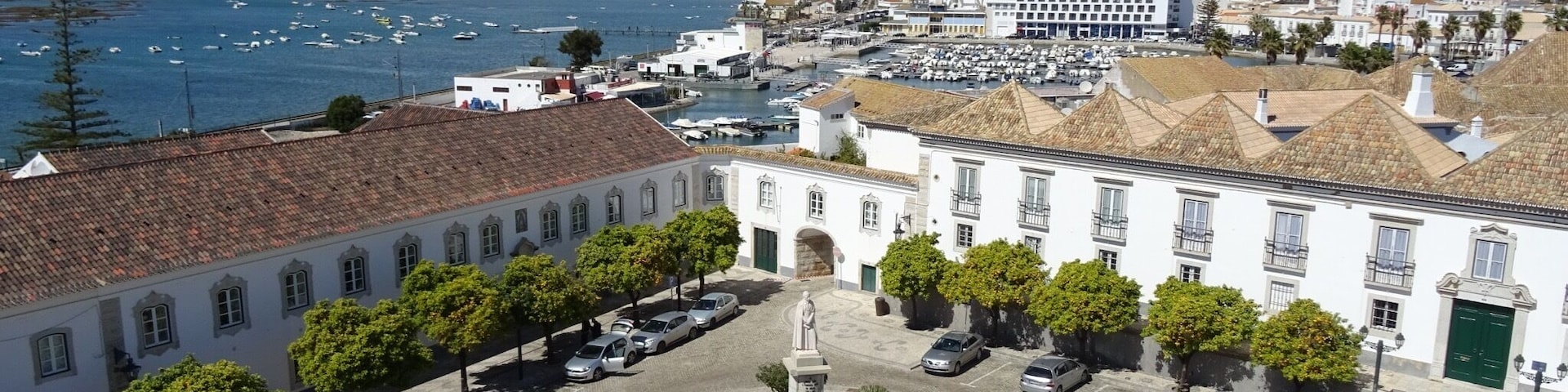 Overlooking the square lined with #orangetrees from the top of the #belltower #faro #portugal #church #view