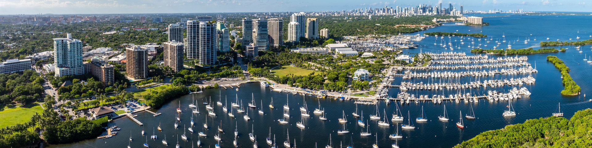 Aerial view of coconut grove marina with sailboats and cityscape, Coconut Grove, Florida, USA.