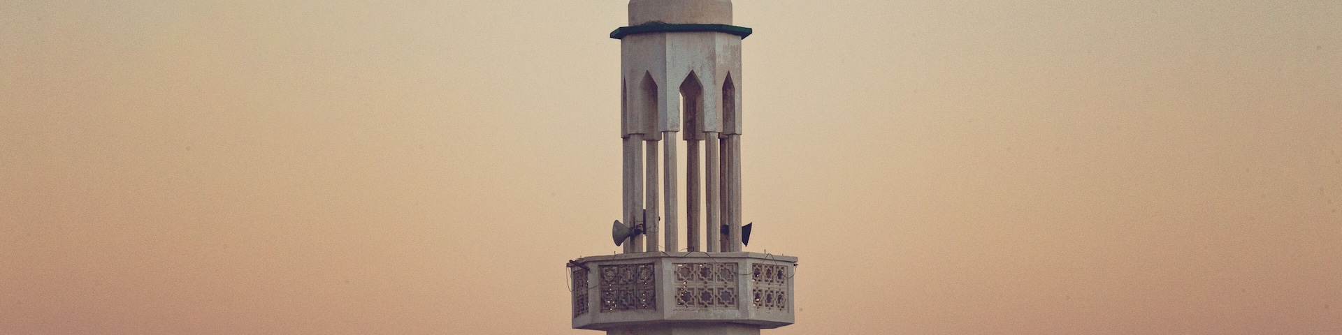 Beautiful sunset in Dahab, mosque minaret at sunset, South Sinai, Egypt