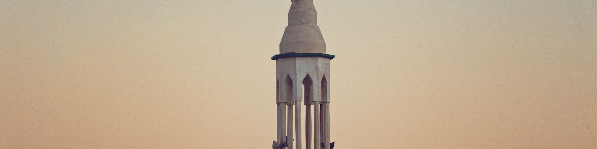 Beautiful sunset in Dahab, mosque minaret at sunset, South Sinai, Egypt