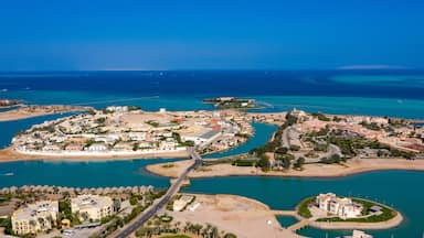 Aerial view of El Gouna's distinctive island villas connected by canals and bridges, showcasing the Venice-inspired design of this Egyptian Red Sea resort town.