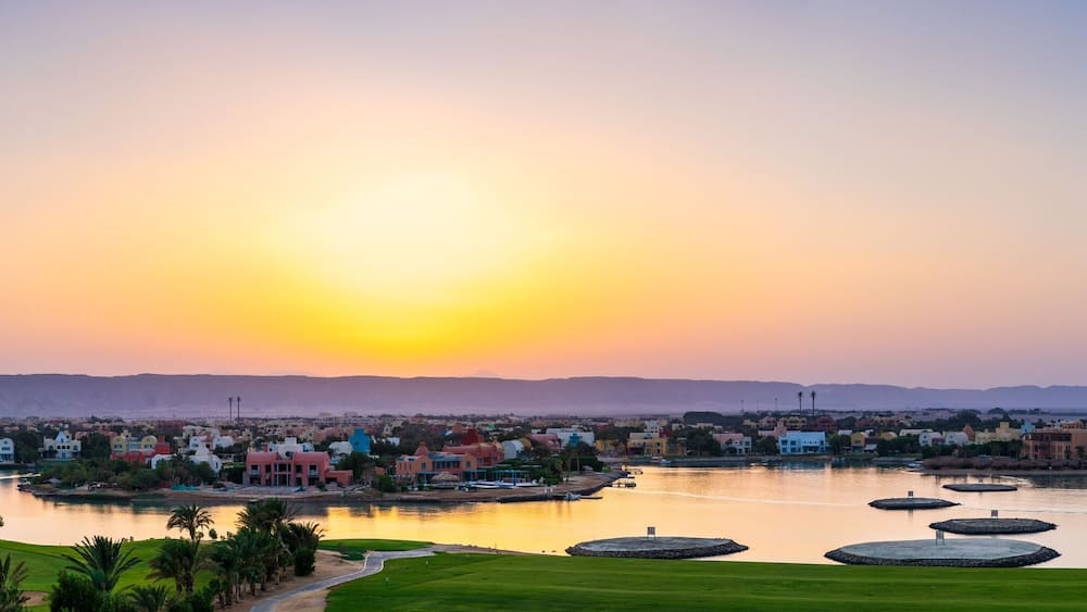 Idyllic Lakeside Golf Course with Vibrant Sunset in Scenic Landscape at El Gouna Red Sea Agypt