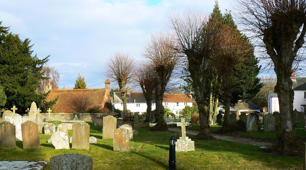 Churchyard, St Mary's Church, Kintbury Most of the pleasant and attractive churchyard is to the south of the church. The houses in the background are in Church Street.