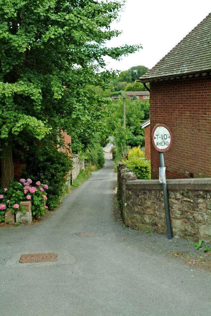 Barkers Lane Much of the central area of Cleobury Mortimer is in a conservation area. According to South Shropshire District Council, "The town retains some of its medieval planned form with a central High Street and long, narrow burgage plots leading off from this; around the perimeter are back lanes". Barkers Lane is one of these lanes and is seen here looking from its junction with Church Street, Lower Street and The Hurst. The building on the right is the Methodist Church.