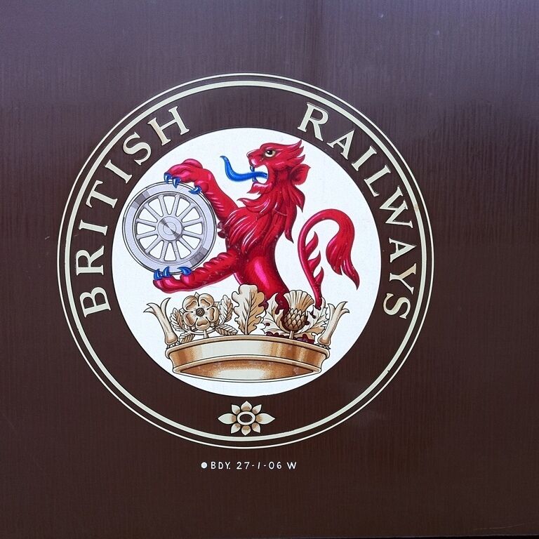 Took this photo on an old restored steam railway engine which was going to pull a dinner train where a murder mystery was happening

Love the emblem. It's now my computer's wallpaper