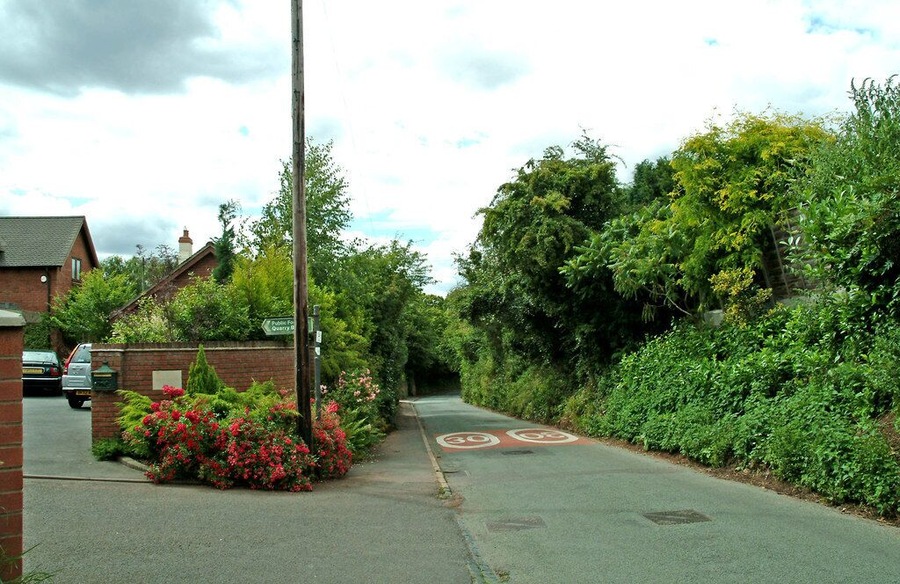 Inn Lane, Hartlebury This view is of a section of the long road known as Inn Lane in the village of Hartlebury. On the left there is the start of a public footpath which leads to the road known as Quarry Bank.
