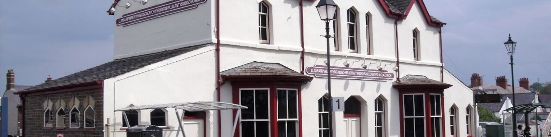 Llanfairpwllgwyngyllgogerychwyndrobwllllantisiliogogogoch station on the Holyhead North Wales line. Town is famous for its long name and there is now a fantastic tourist shop providing all kinds of souvenirs, hobbies and clothing.