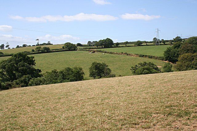 Pastoral Valley. High voltage powerlines span the valley. It seems you cannot go far in the mid Cornwall countryside without encountering a set of powerlines.