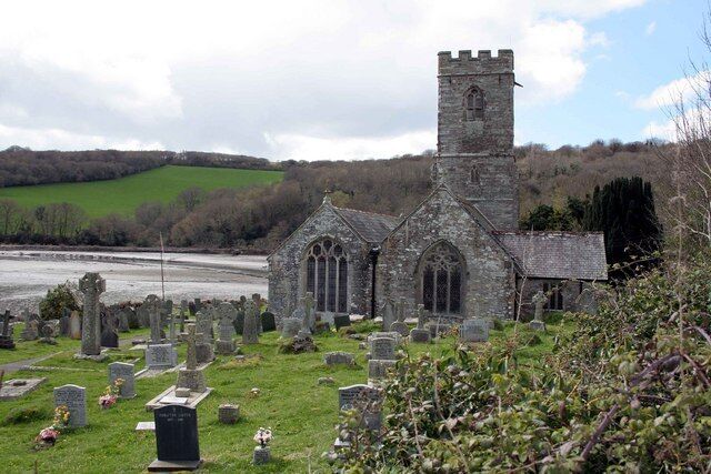St Winnow parish church, Cornwall, seen from the east, with the Fowey estuary beyond