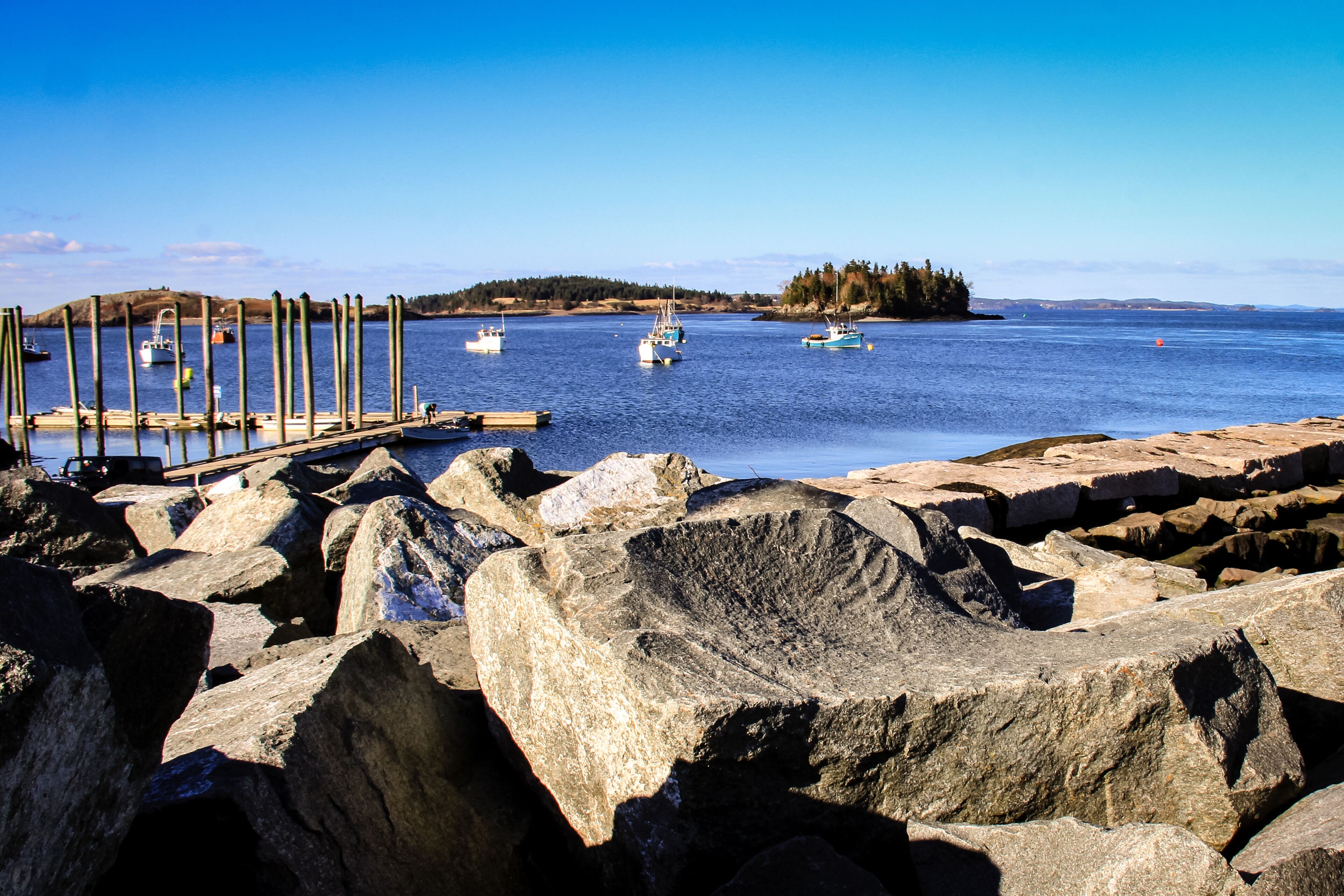 Lobster boats anchored in the Atlantic Ocean surrounded by the islands of the Maine Coast, Jonesport, Maine