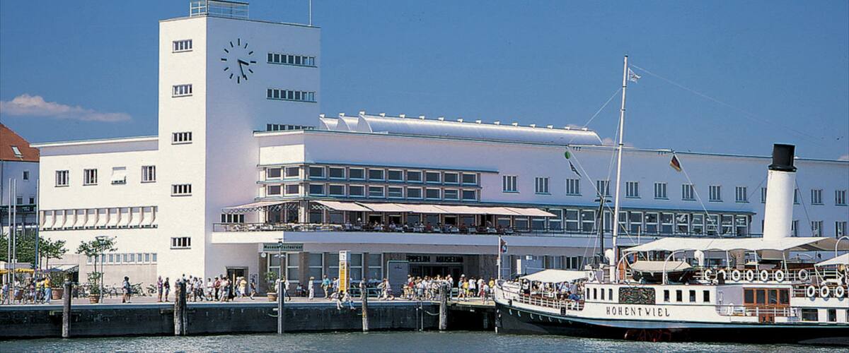 Friedrichshafen featuring a marina, a ferry and street scenes