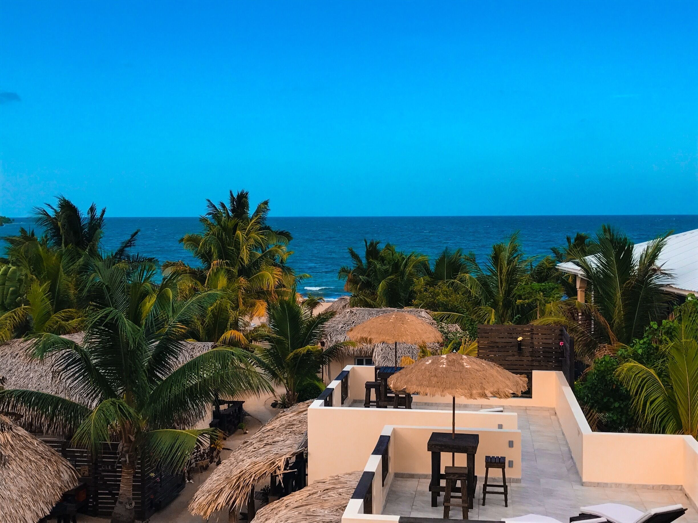 View of the ocean from La Hacienda at Caribbean Beach Cabanas in Placencia, Belize - Amazing hosts: Carlos & Sue #beachbound