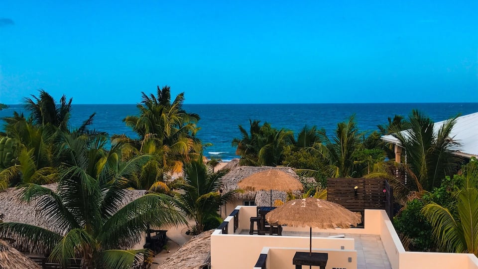 View of the ocean from La Hacienda at Caribbean Beach Cabanas in Placencia, Belize - Amazing hosts: Carlos & Sue #beachbound