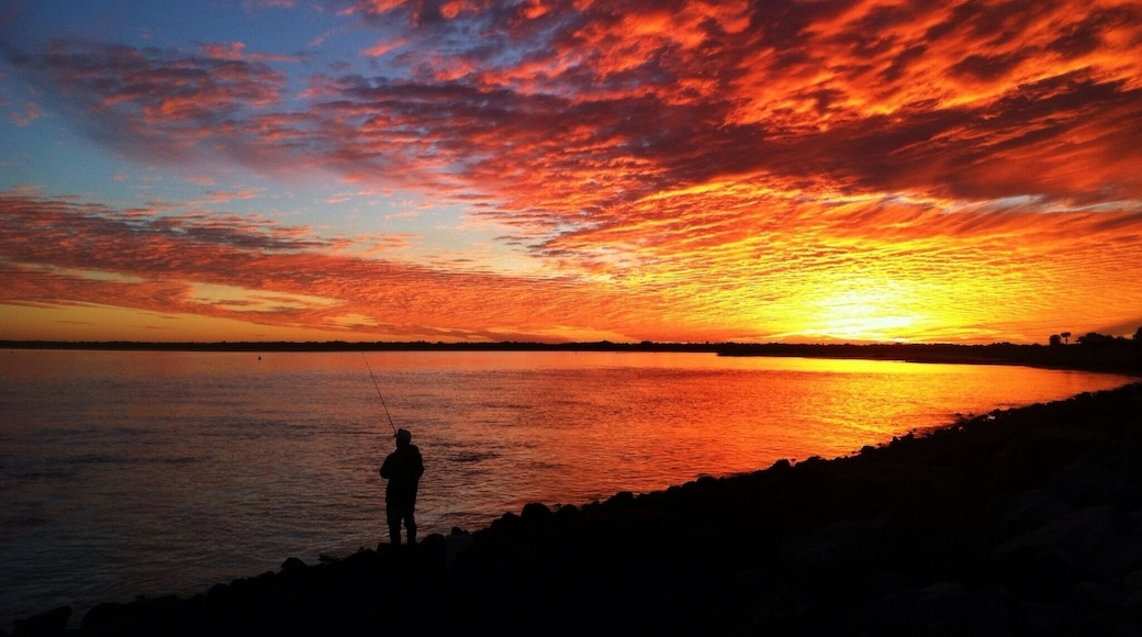 One of the best sunsets I've seen while living here in Florida. I was glad I chose to hike out to the pier instead of staying at the top of the Ponce Inlet Lighthouse. Sometimes you can see manatees and dolphins swimming near the inlet. One of the most relaxing parks in the Daytona Beach area.