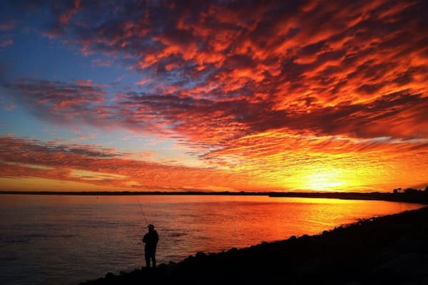 One of the best sunsets I've seen while living here in Florida. I was glad I chose to hike out to the pier instead of staying at the top of the Ponce Inlet Lighthouse. Sometimes you can see manatees and dolphins swimming near the inlet. One of the most relaxing parks in the Daytona Beach area.