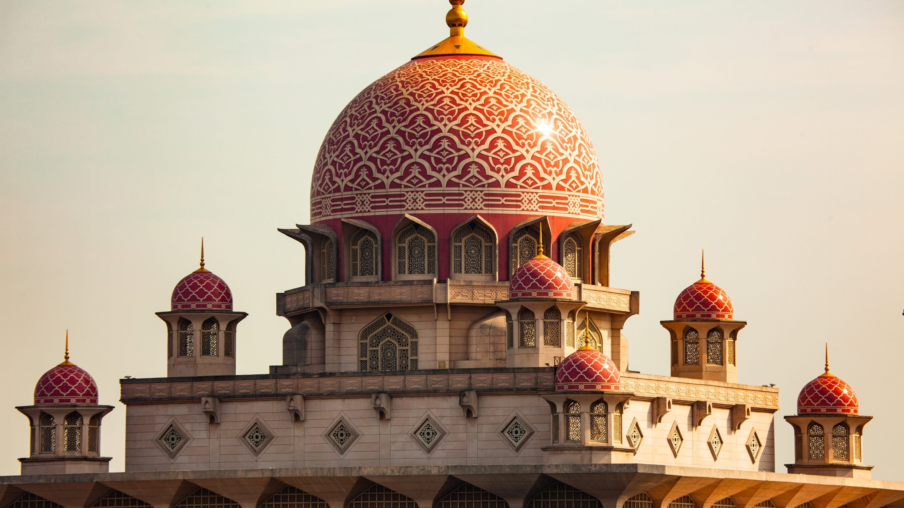 Putrajaya which includes a sunset and heritage architecture