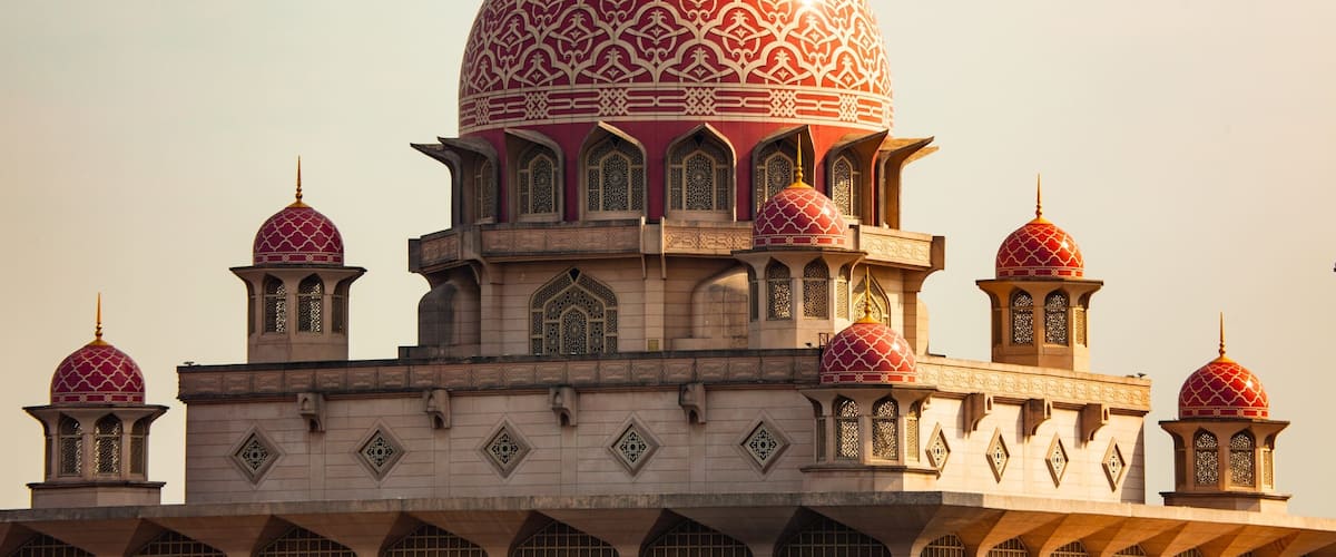 Putrajaya which includes a sunset and heritage architecture