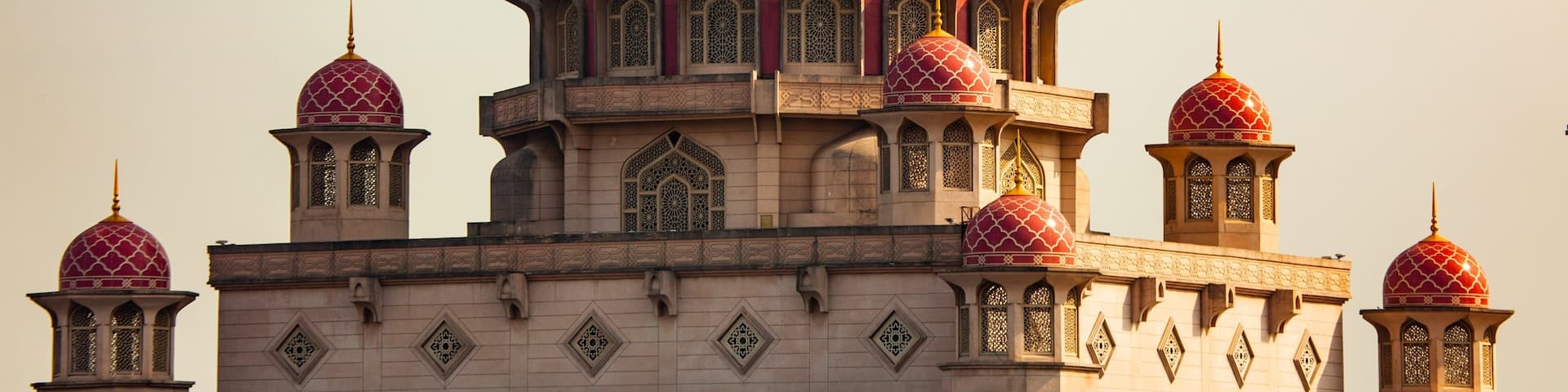 Putrajaya which includes a sunset and heritage architecture