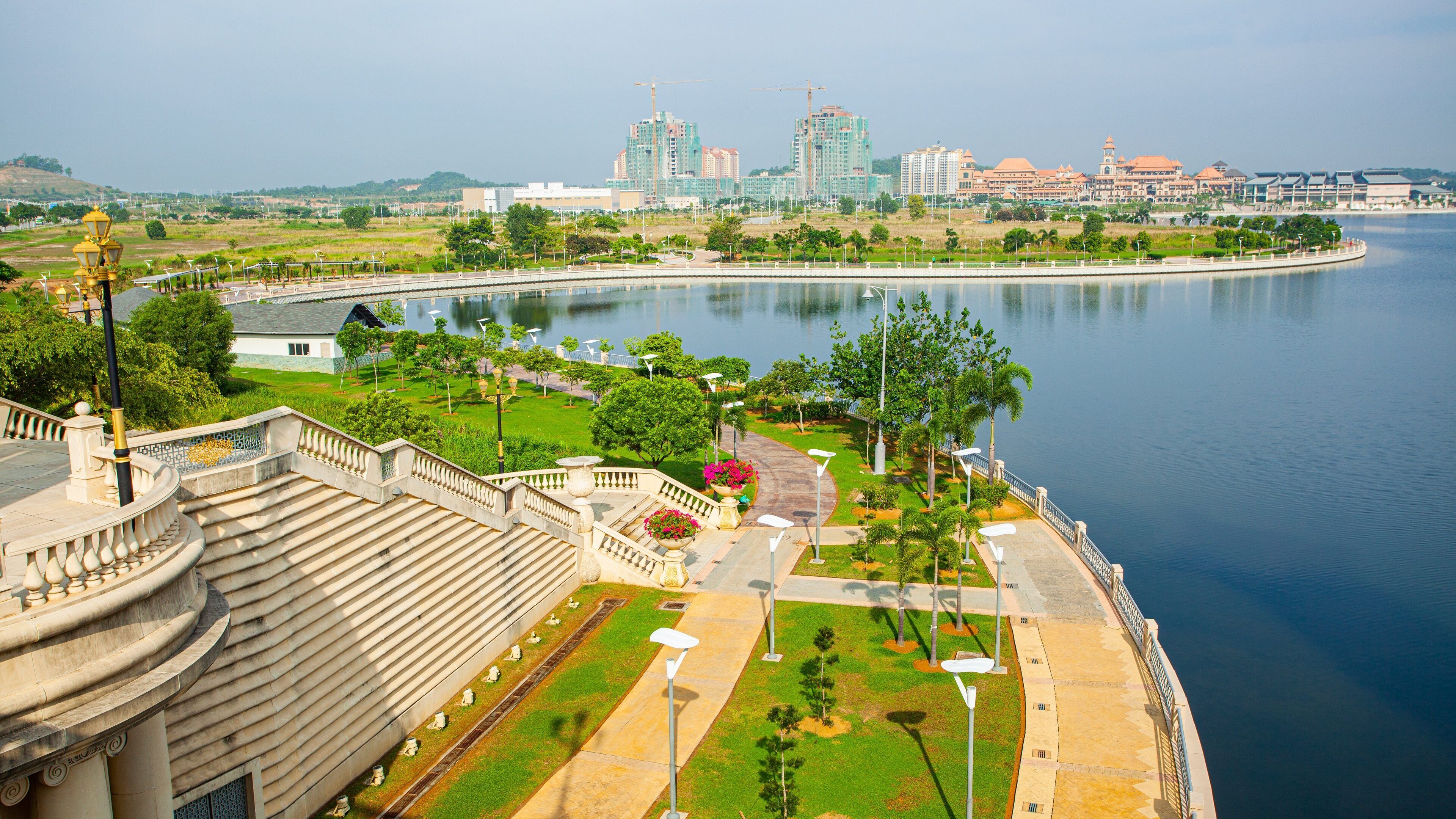 Putrajaya which includes a river or creek, a garden and landscape views