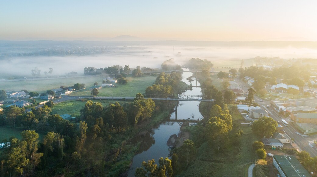 Aerial view of Hunter River at sunrise on foggy autumn morning in the Hunter Valley