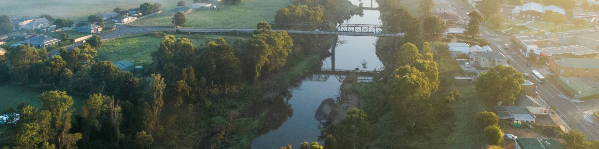 Aerial view of Hunter River at sunrise on foggy autumn morning in the Hunter Valley