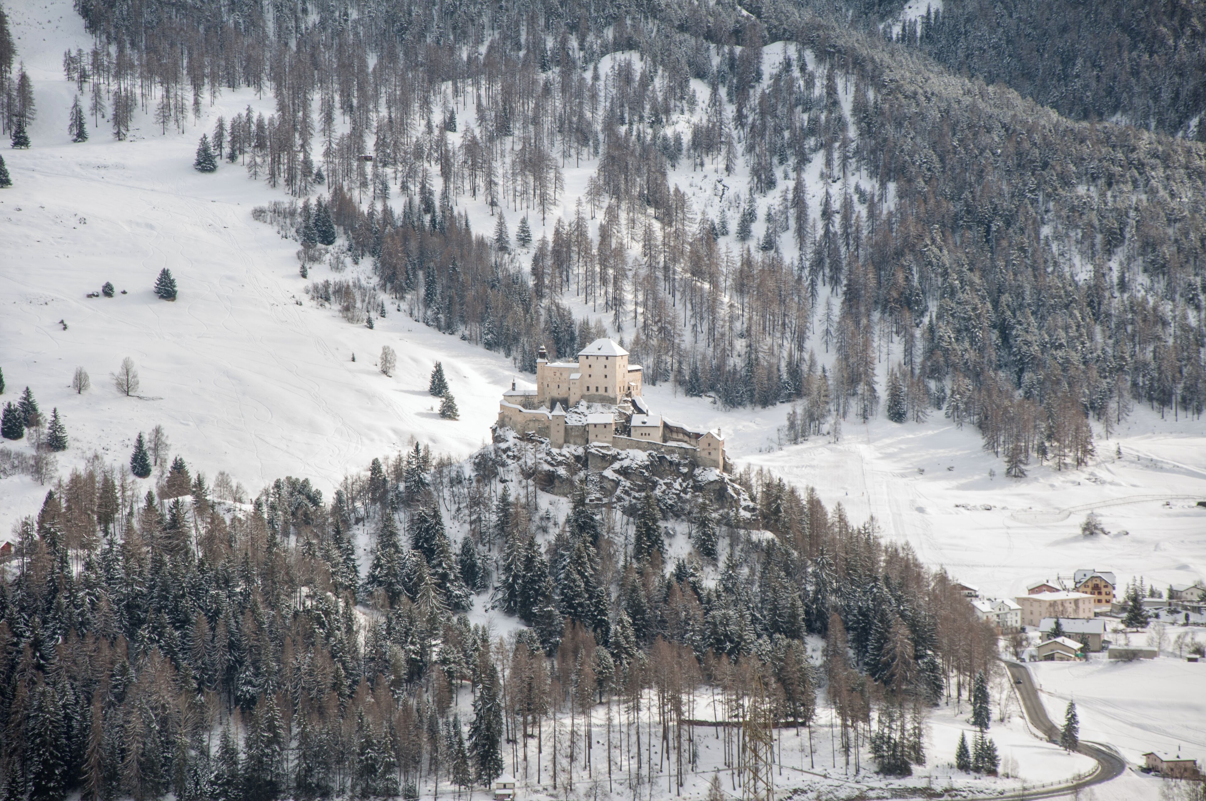 Switzerland, Graubünden, Tarasp castle in winter
