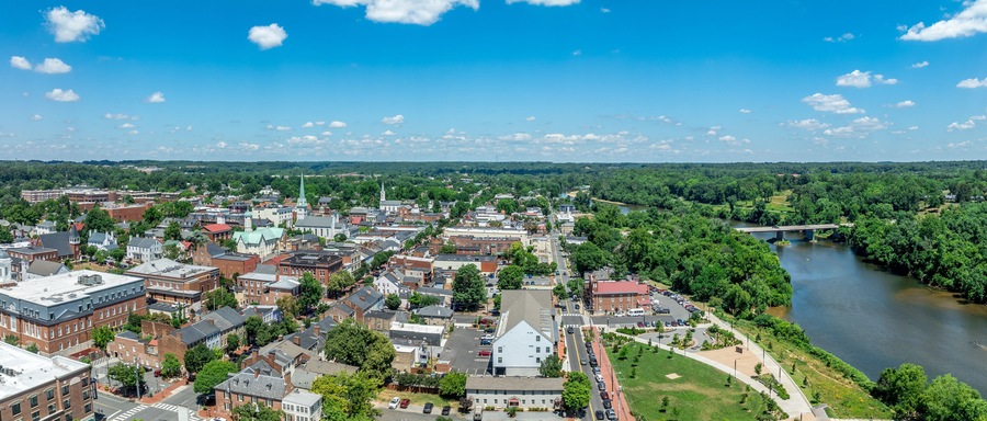 Aerial view Fredericksburg Virginia with Circuit Court building , historic business district, Baptist church, Chatham bridge over Rappahannock River