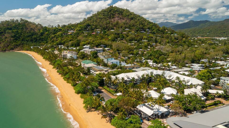 Trinity Beach featuring a coastal town, landscape views and general coastal views