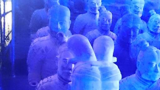 Terracotta Army Exhibition with life size replicas of the army highlighted with #blue light