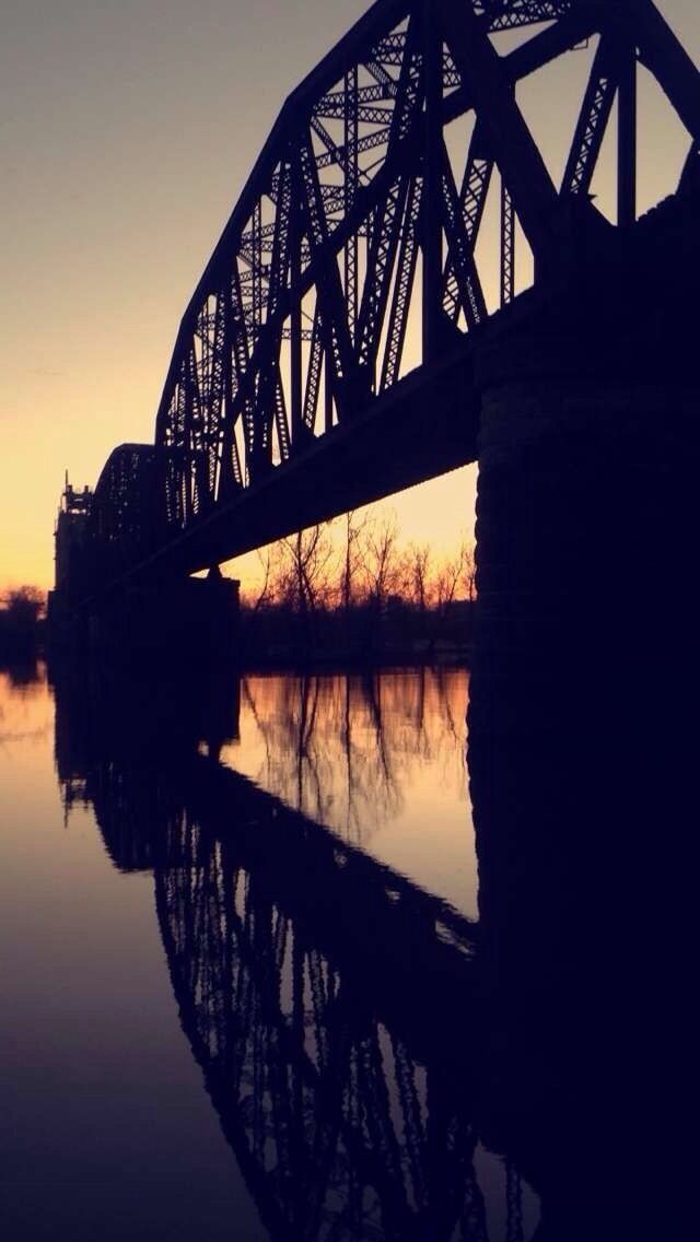 Train bridge behind the chicken plant. It's especially beautiful during sunset. 