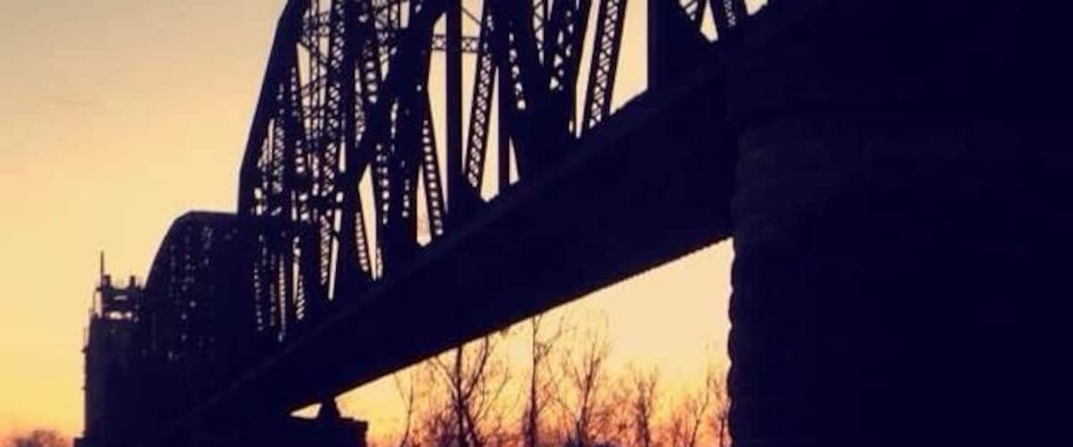 Train bridge behind the chicken plant. It's especially beautiful during sunset.