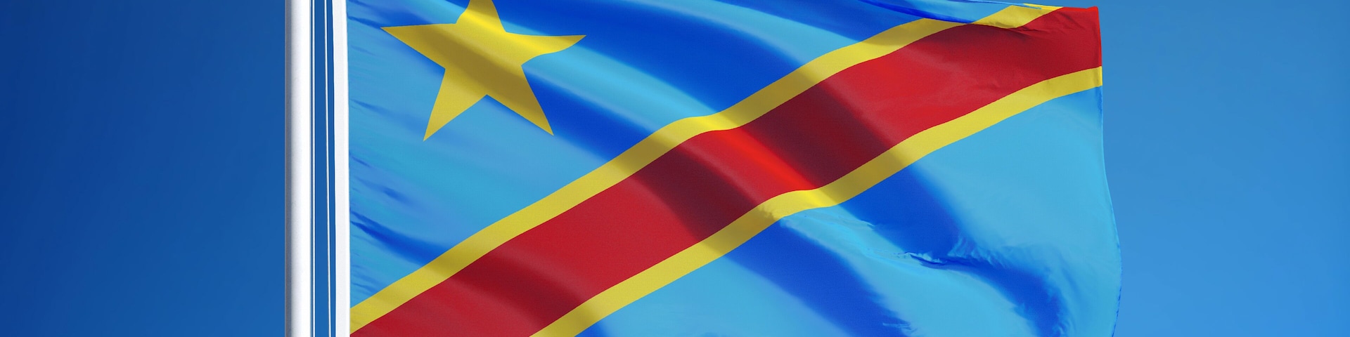 Democratic Republic of the Congo flag waving against clean sky, close up, isolated with clipping path mask alpha channel transparency, for film, news, digital composition