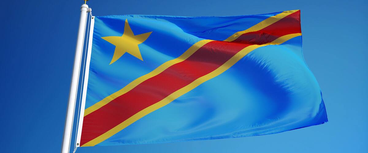 A flag with a blue field, a yellow star, and red and yellow stripes.