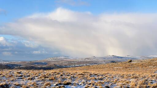 Cloud over the range of tors along the western edge of Dartmoor. From left to right the tors clearly visible are: Brent Tor, Cox Tor, Middle Staple Tor, Great Staple Tor and Roos Tor.