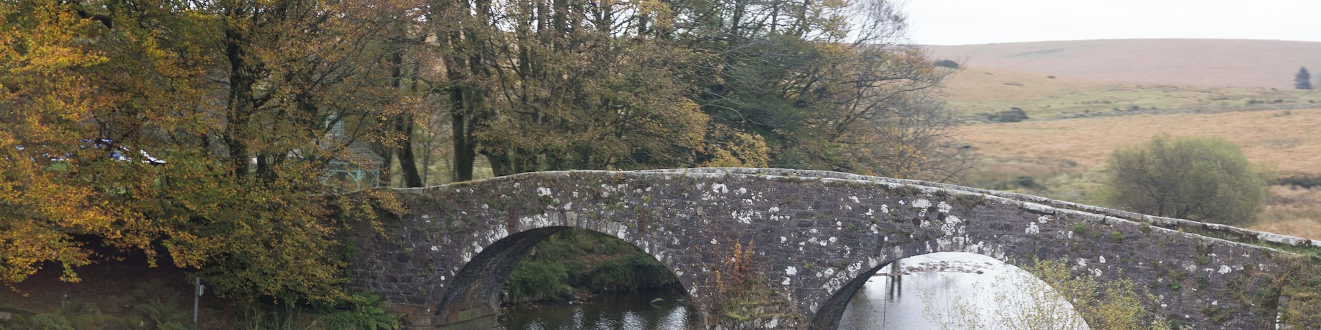 Old bridge over West Dart River in Two Bridges, Princetown, Devon.