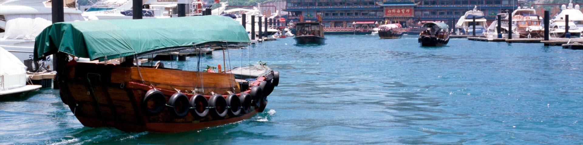 Aberdeen showing a high rise building, mountains and a bay or harbor