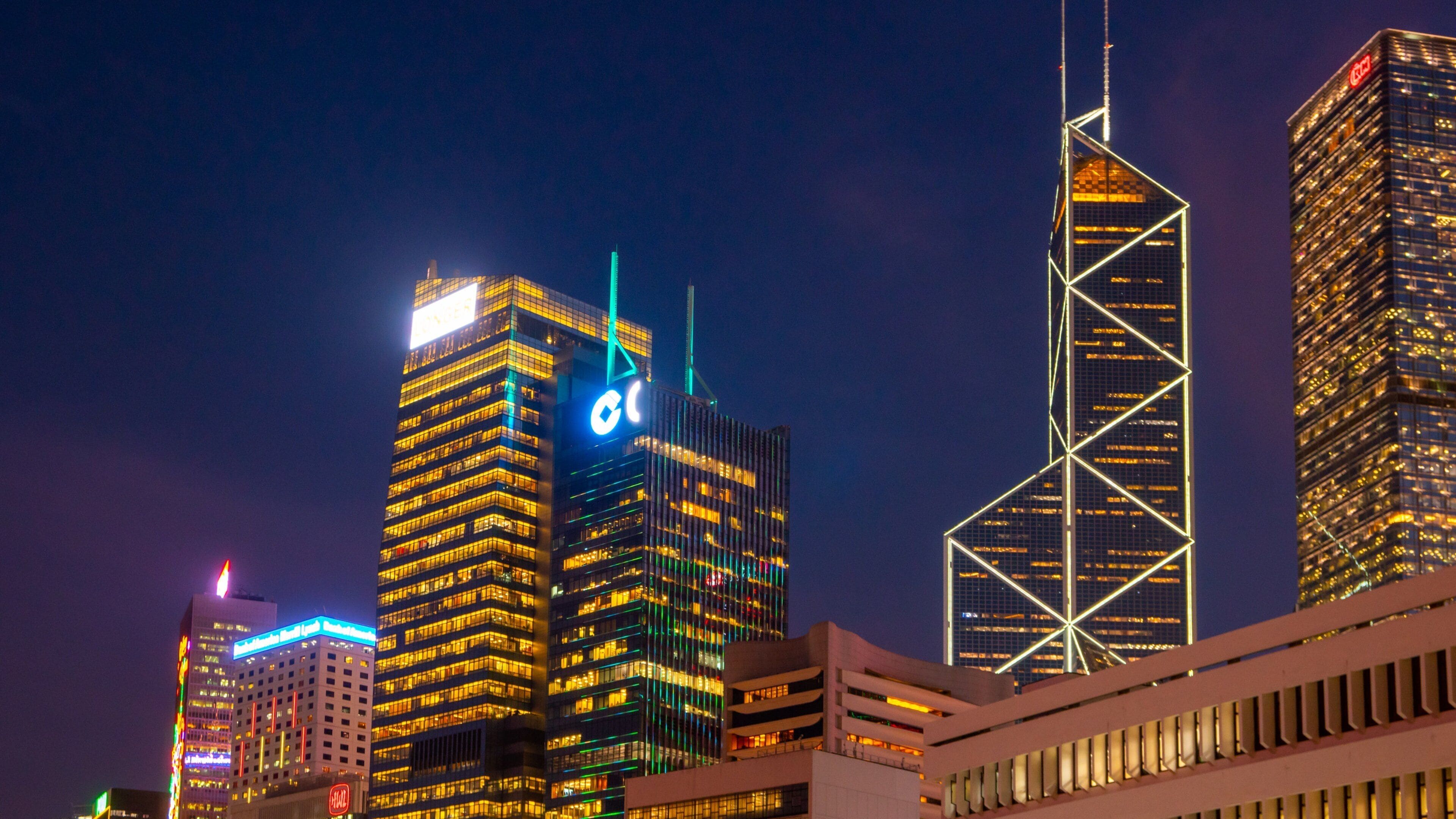 Central featuring a city, night scenes and a high rise building