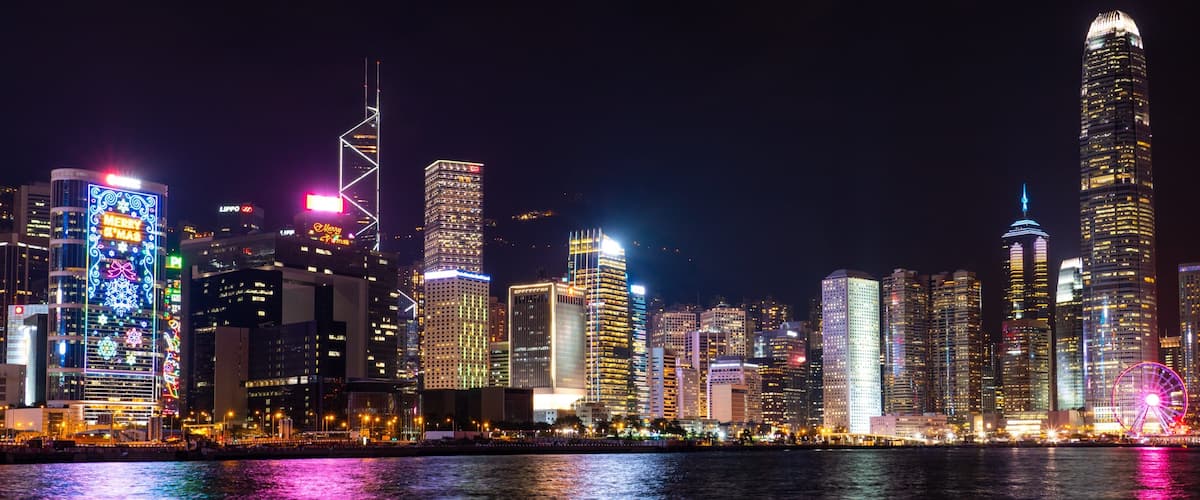 Wan Chai which includes a city, a bay or harbor and night scenes