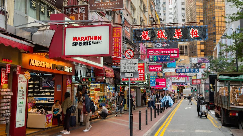 Causeway Bay which includes a city, signage and street scenes