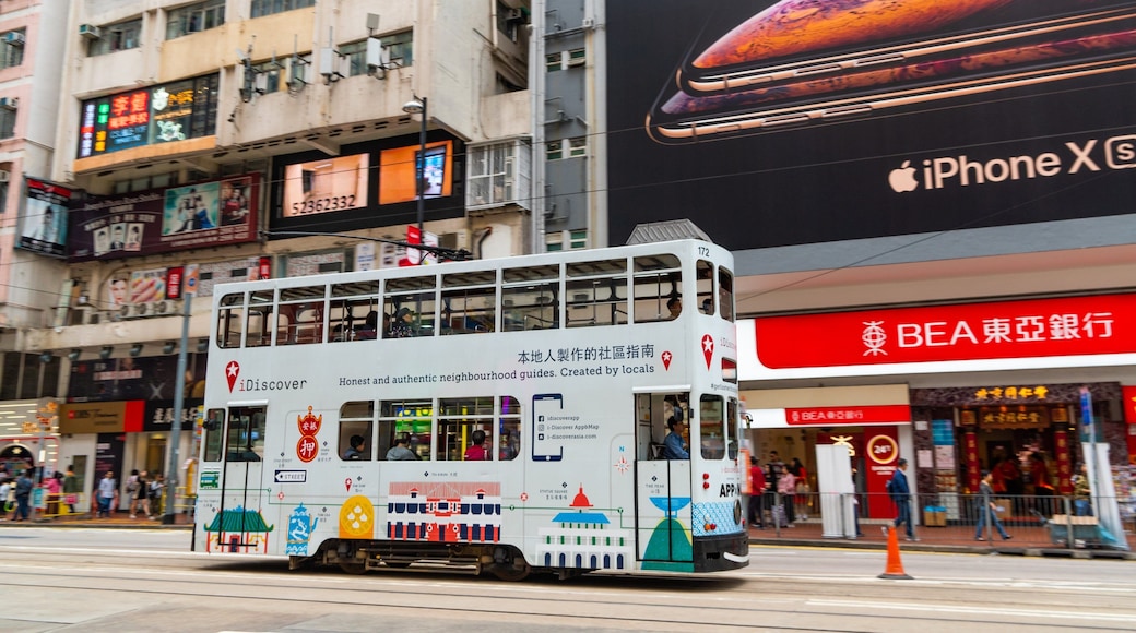 Causeway Bay showing street scenes, a city and railway items