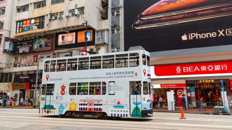 Causeway Bay showing street scenes, a city and railway items