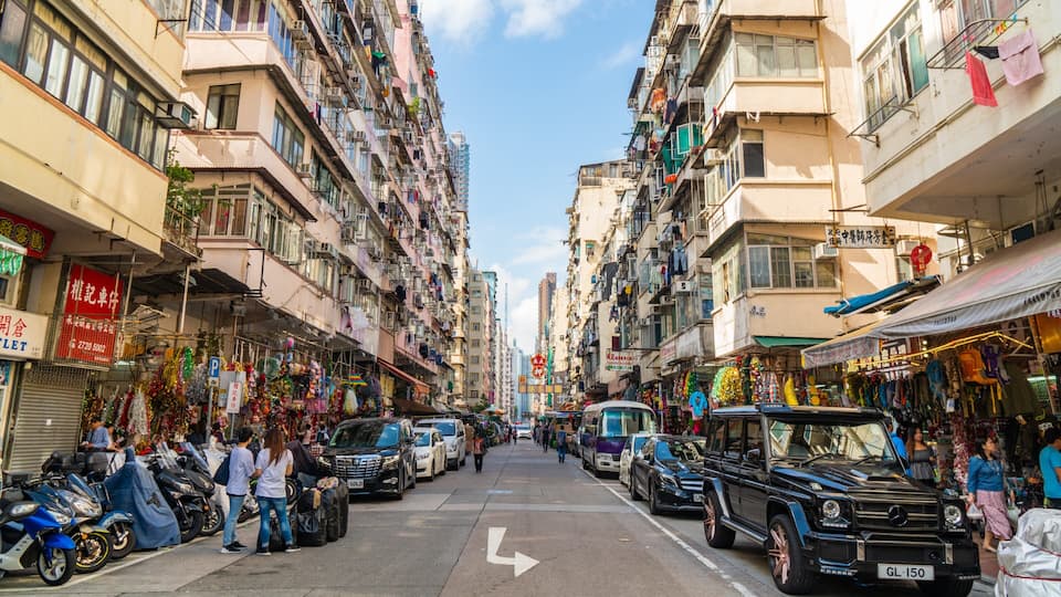 Sham Shui Po which includes street scenes and a city