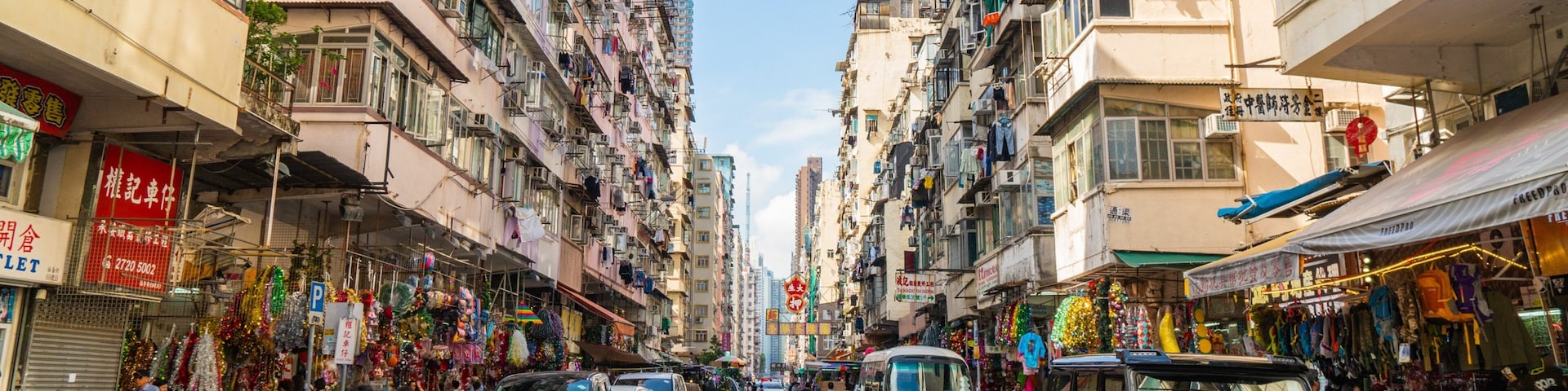 Sham Shui Po which includes street scenes and a city