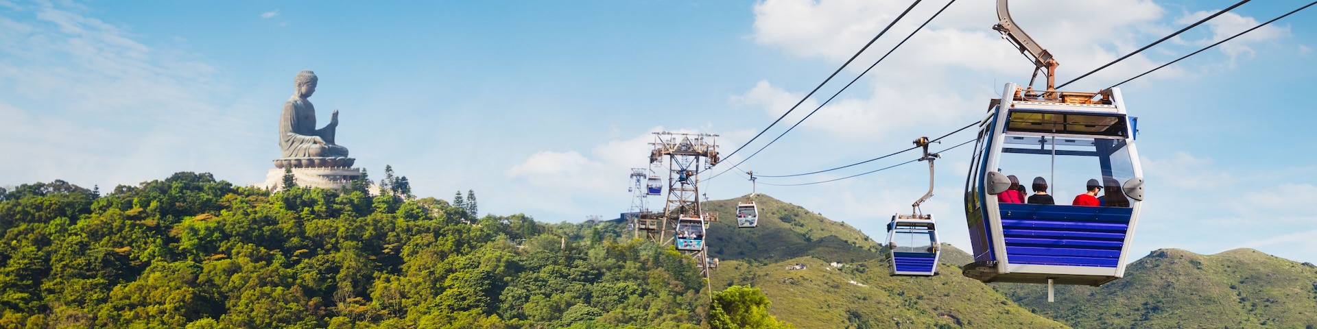 Ngong Ping cable car with big buddha statue in background, Hong Kong China, Shutterstock ID 793844776, Purchase Order: SP-1900, Order Number: SP-1900 Go Guides, Client/Licensee: Hotels.com, Other: Sup